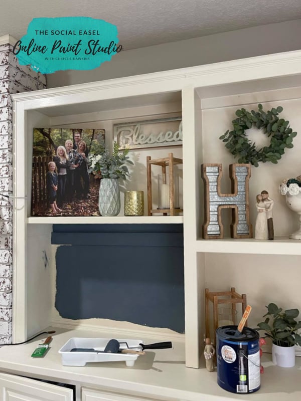 Trial of the dark blue accent wall color for painting the backs of built-ins on my TV Wall Makeover The Social Easel Online Paint Studio