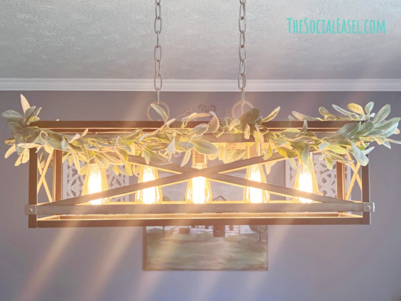 Chandelier with greenery lights on