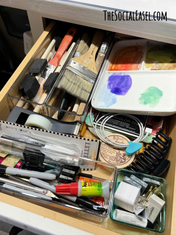 acrylic containers dividing small art supplies in a drawer for my Home Art Studio Storage Solutions