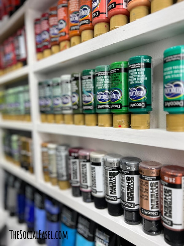 decoart paint on a white wall shelf Home Art Studio Storage Solutions