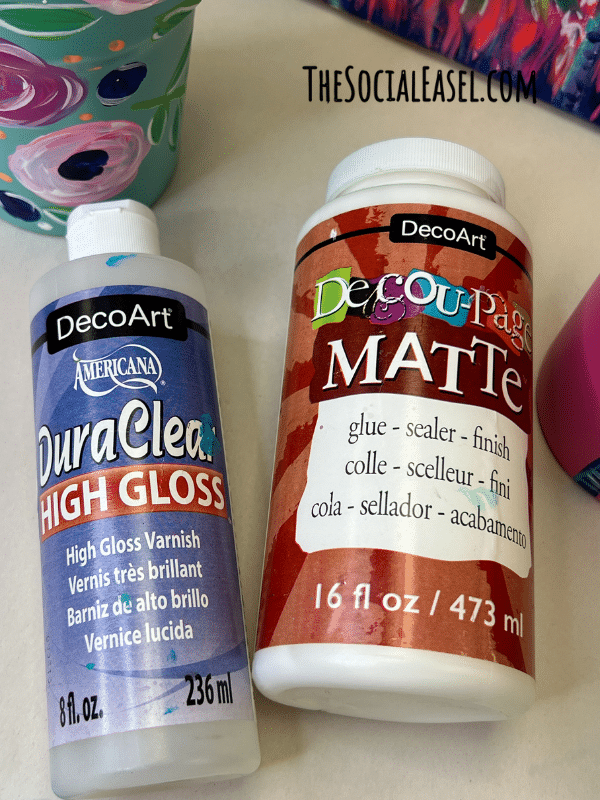 DecoArt Duraclear High Gloss varnish, and DecoArt Decoupage Matte, which is a sealer.. 