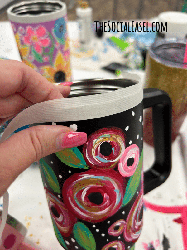 Art tape around the top rim of the cup.