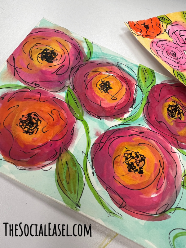 5 bold dark pink blooms with yellow centers and green leaves and stems. All outlined with a black paint pen.