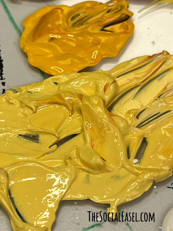 dark gold and yellow paint globs.